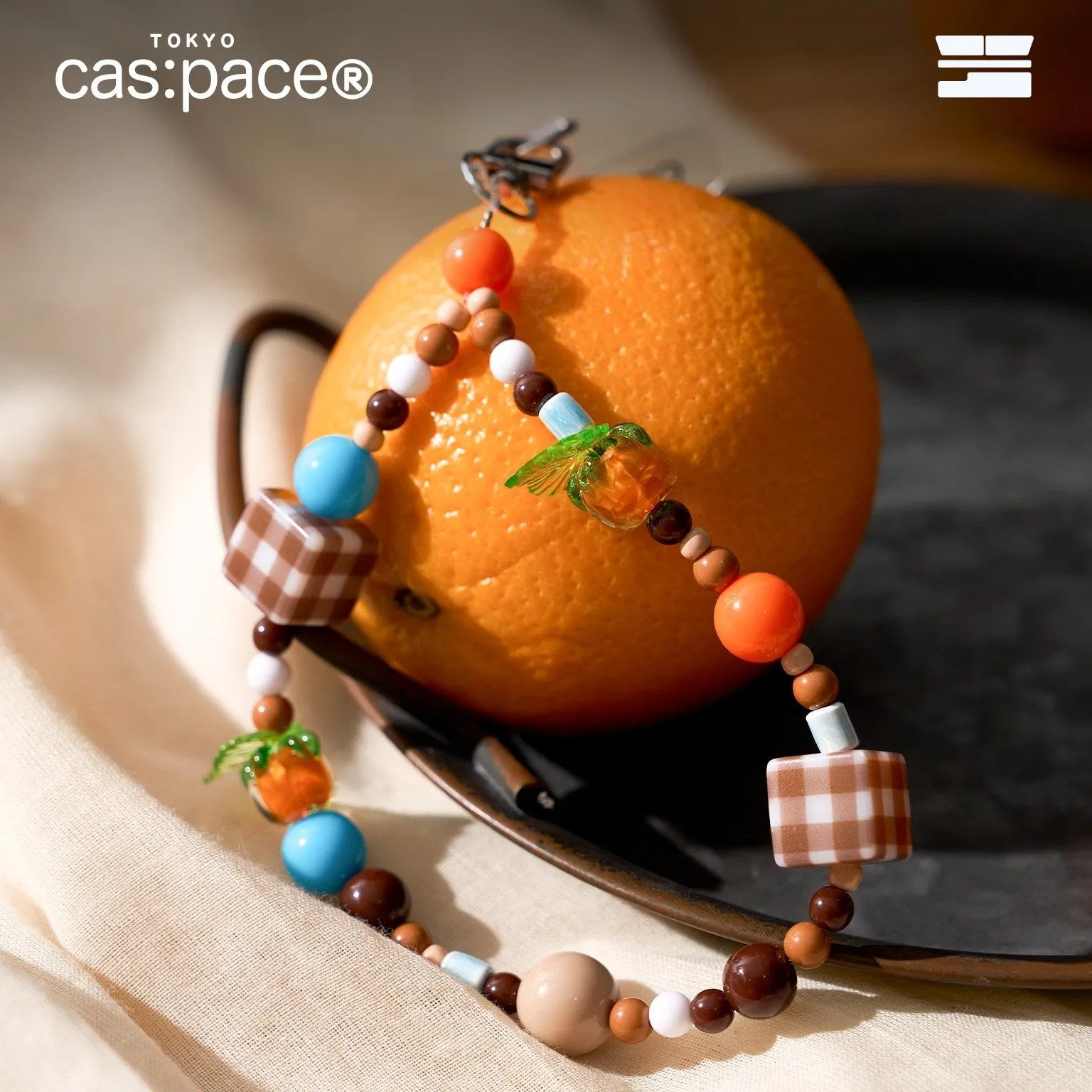 cas:pace 23A/W「オレンジ」布製携帯ケース - cas:pace 殼空間