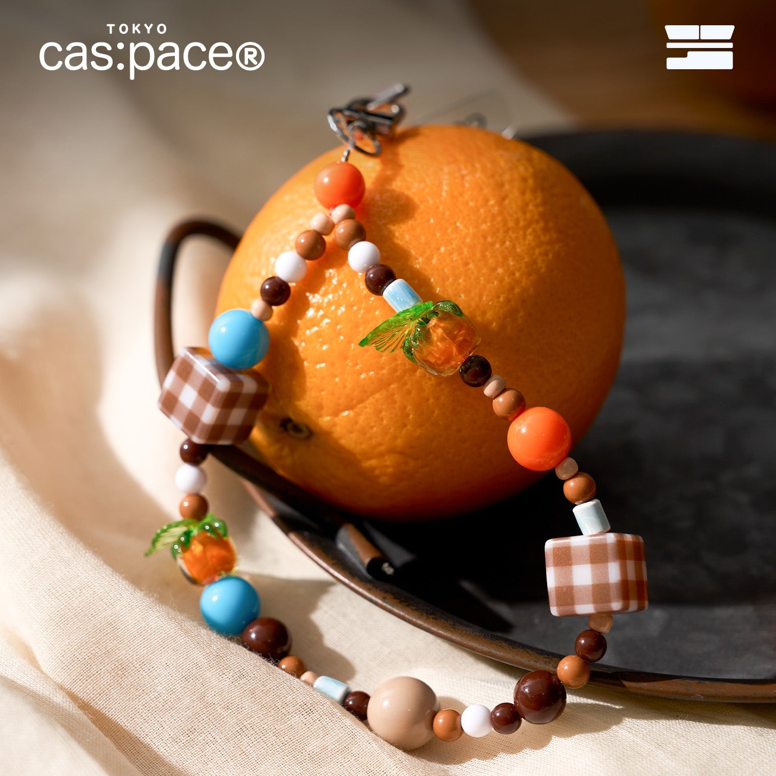 cas:pace 24A/W「orange」携帯ストラップ - cas:pace 殼空間